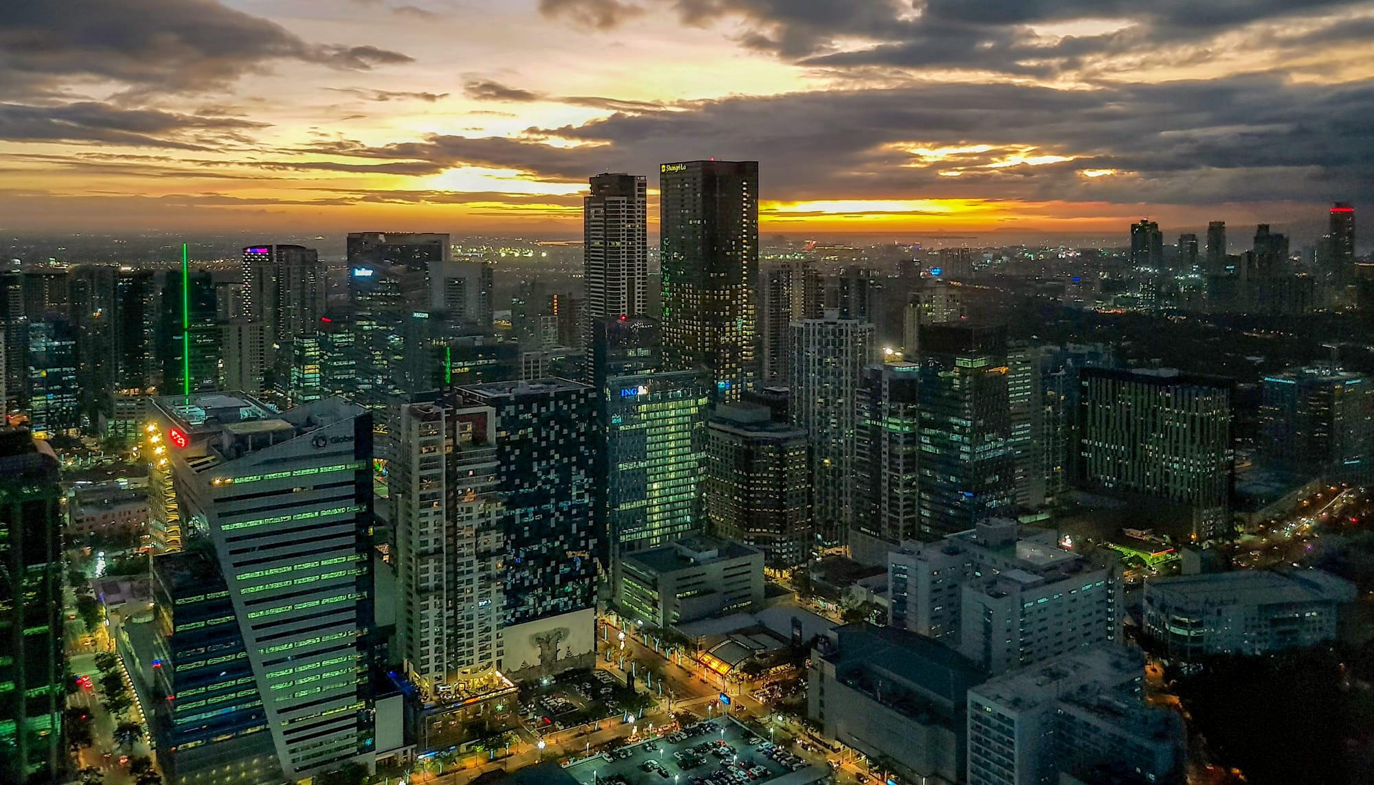 Makati and Bonifacio Global City skylines at sunset, Manila